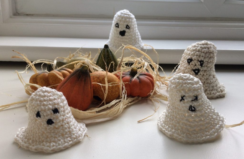 ghosts made out of leftover white yarn