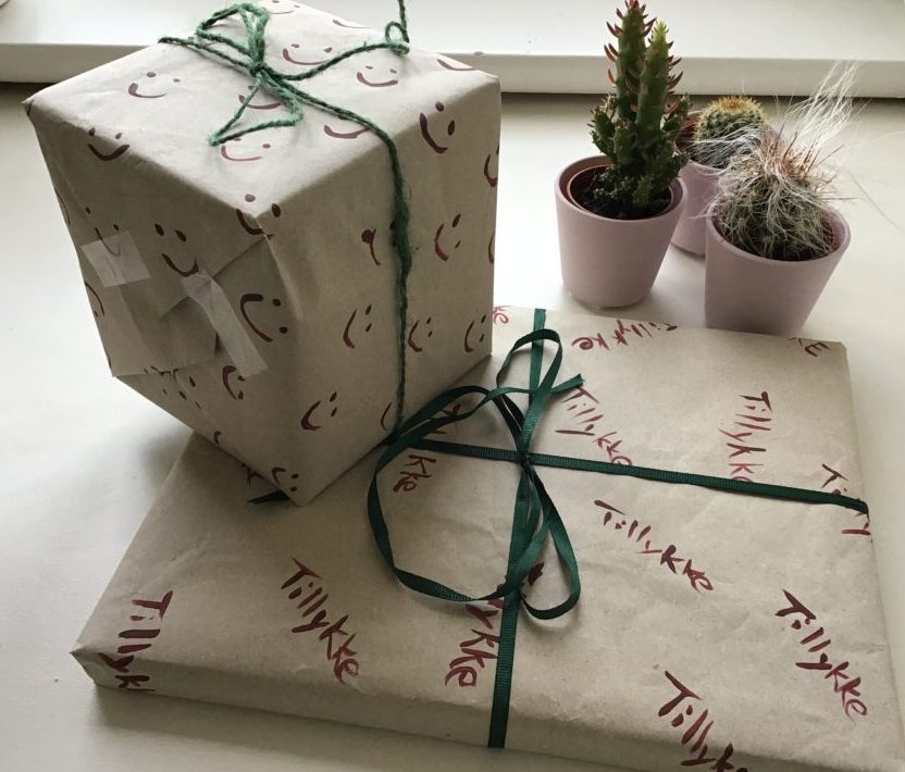 Gifts wrapped in recycled and hand painted paper