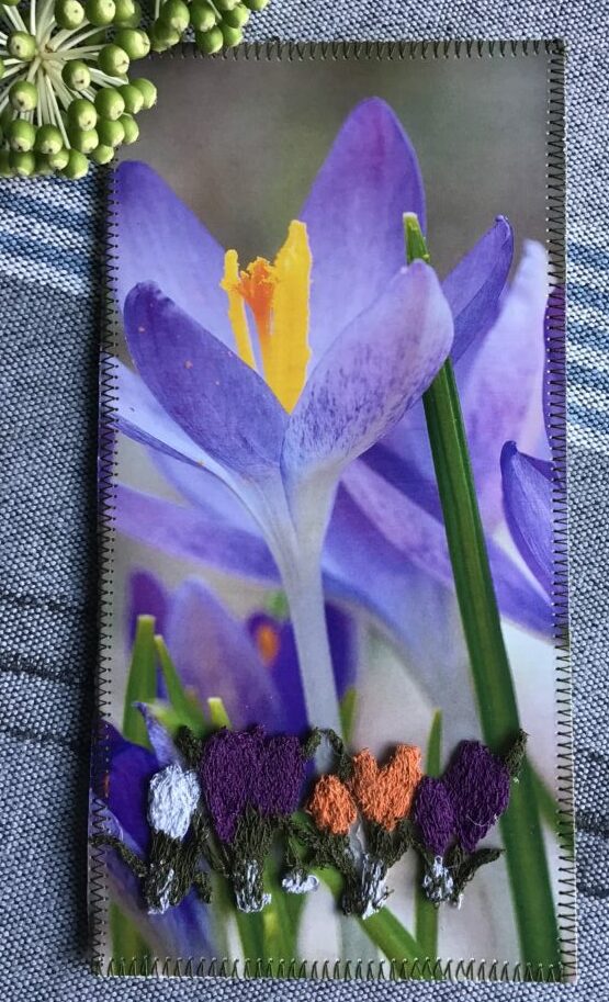 Card with crocuses sewn on water dissoluble fabric
