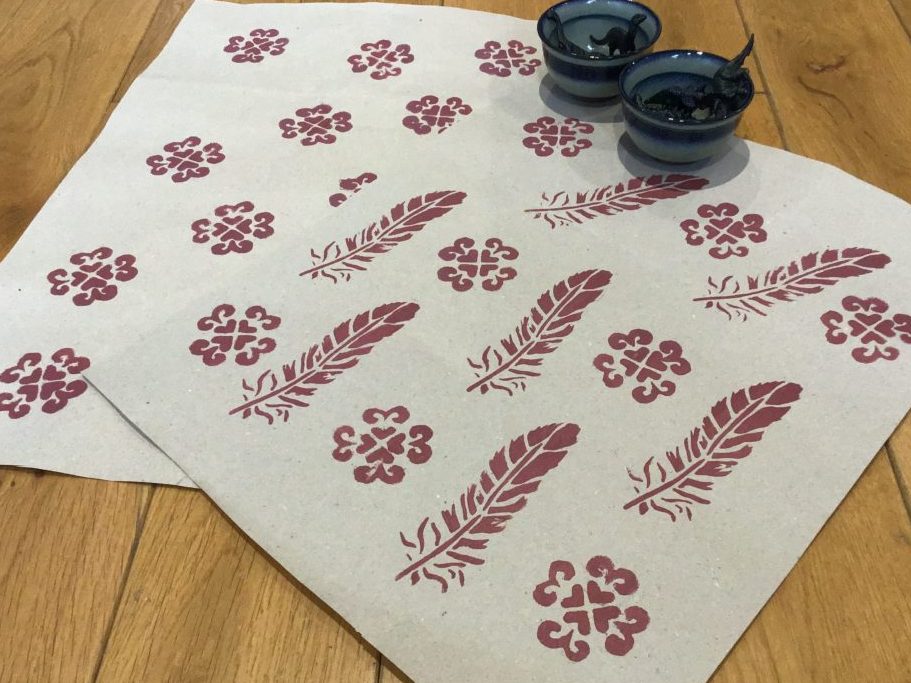 Stencil prints on gift wrapping paper