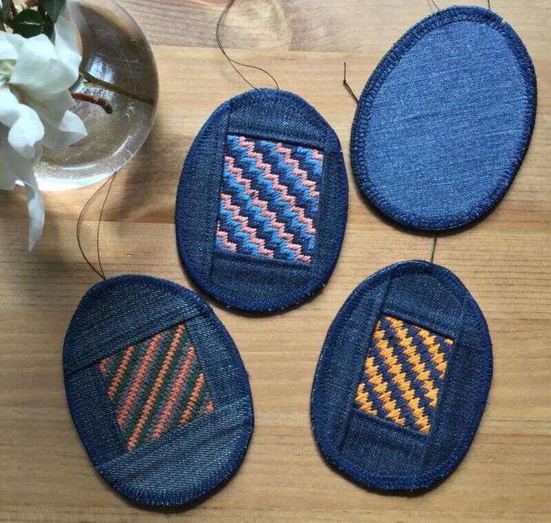 Easter eggs made out of old jeans and embroidery