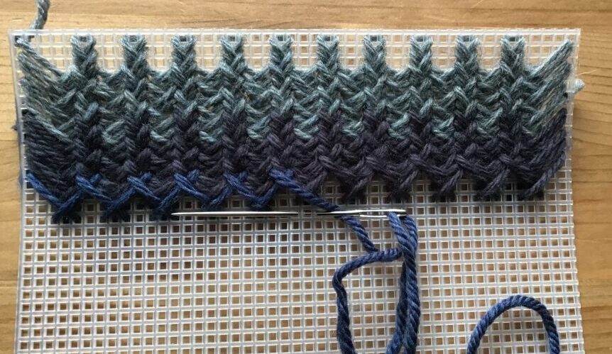 Herringbone embroidery with wool sewn on plastic canvas