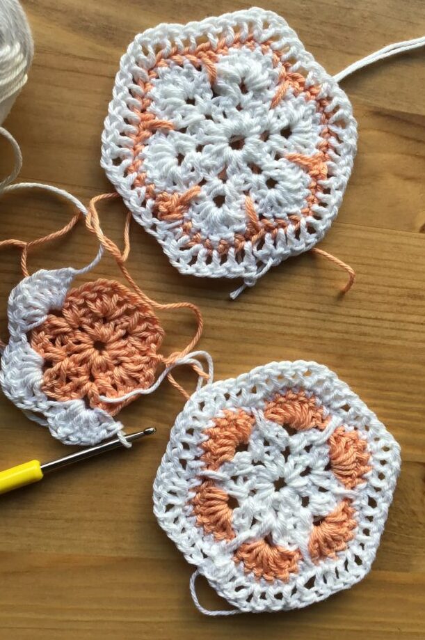 ‘African flower’ squares crocheted in two different colours