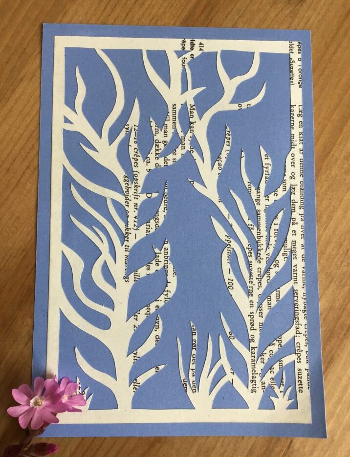 Recycled old book used as material for paper cutting