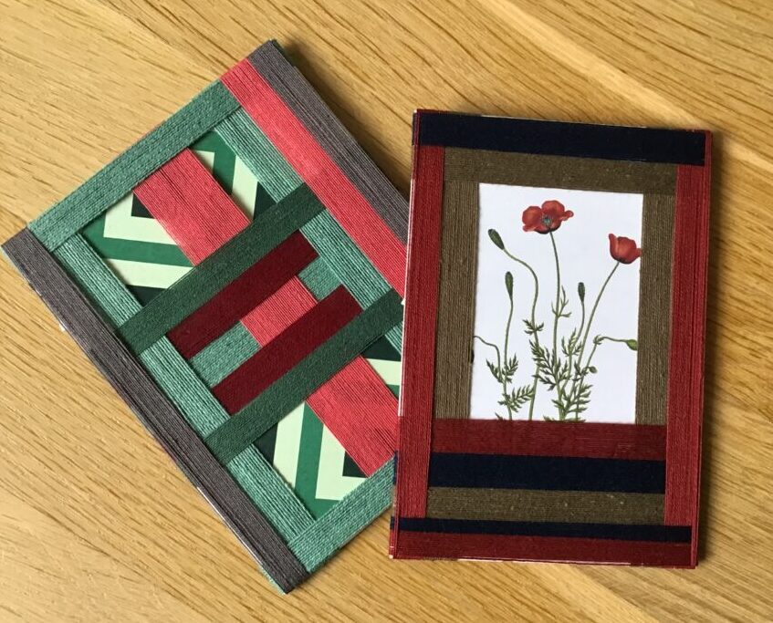 Kort af genbrugsmateriale og broderigarn